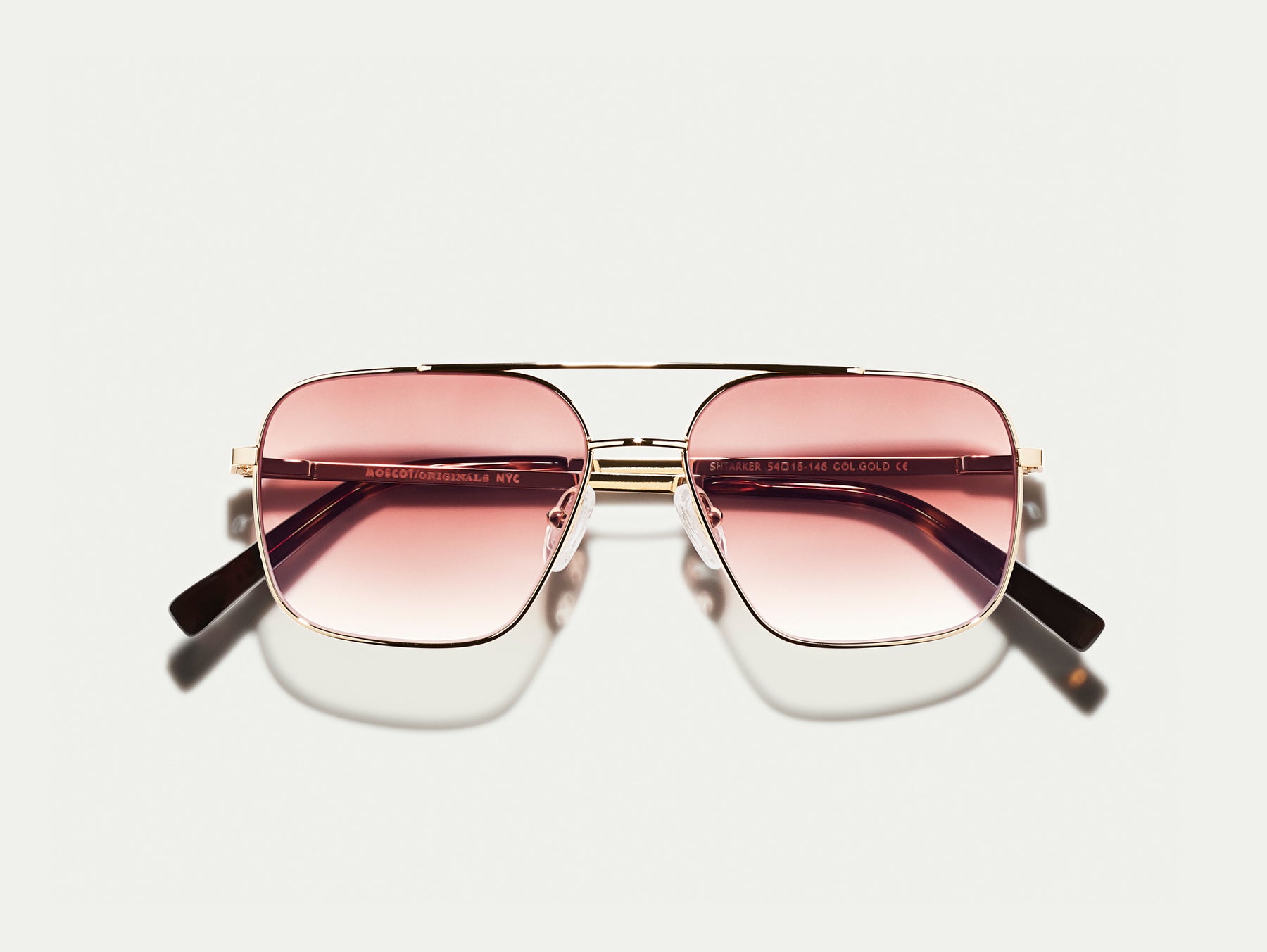 The SHTARKER in Gold with Root Beer Fade Tinted Lenses The SHTARKER in Gold with Root Beer Fade Tinted Lenses