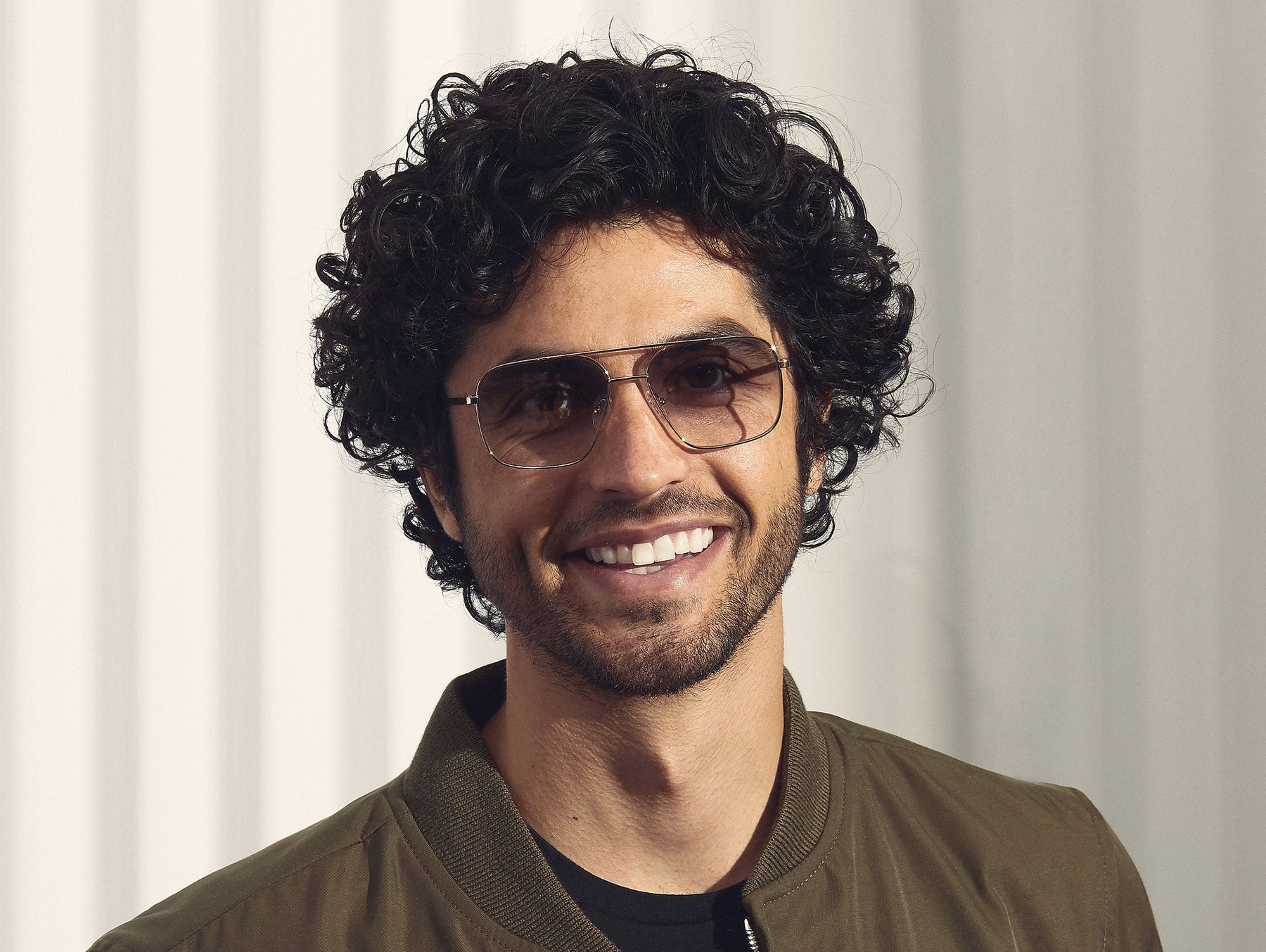 Model is wearing The SHTARKER in size 54 in Gold with American Grey Fade Tinted Lenses Model is wearing The SHTARKER in size 54 in Gold with American Grey Fade Tinted Lenses