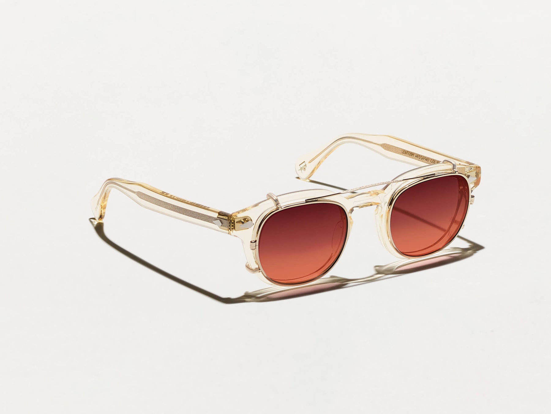 The CLIPTOSH in Gold with Cabernet Tinted Lenses The CLIPTOSH in Gold with Cabernet Tinted Lenses