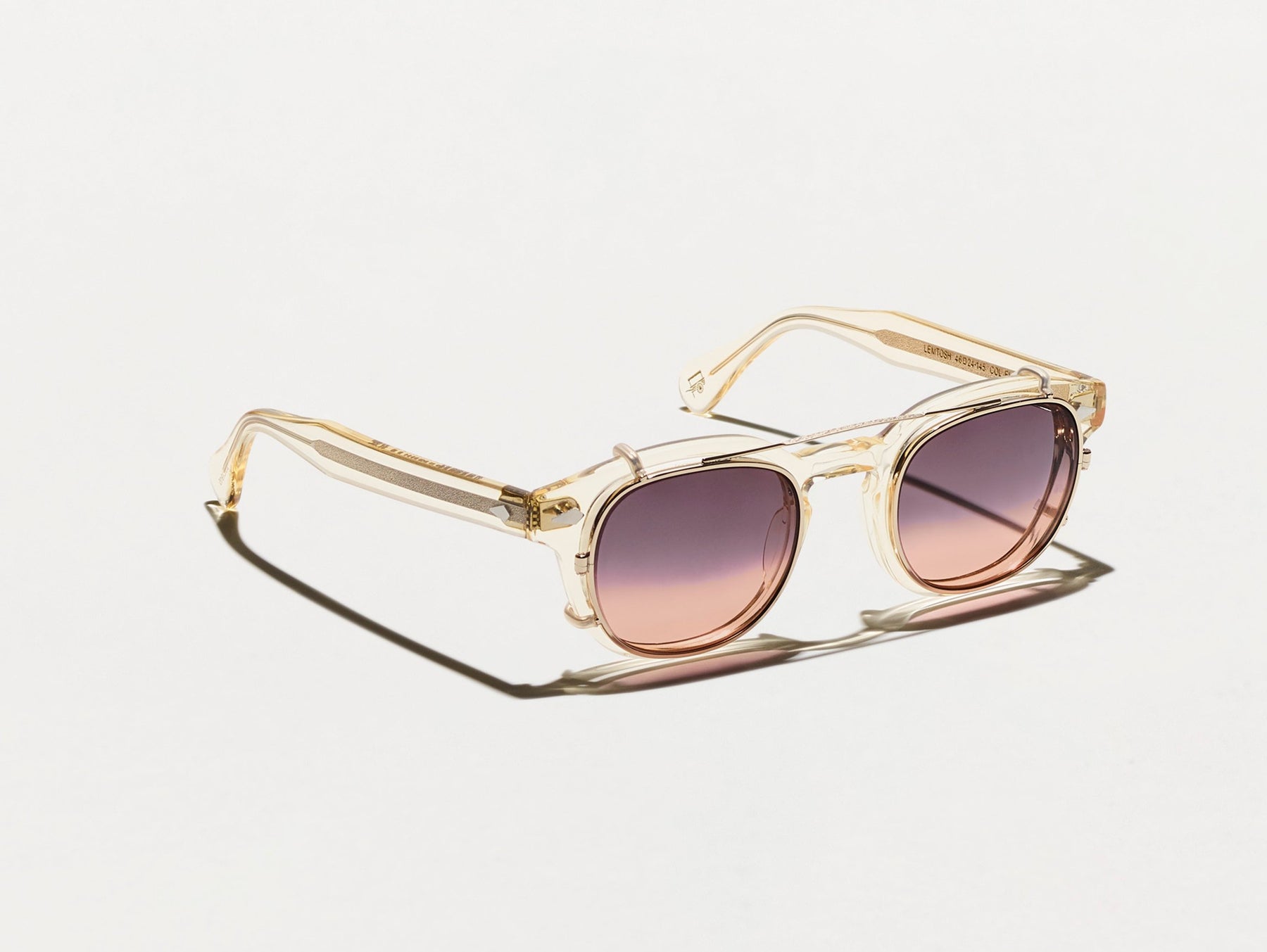 The CLIPTOSH in Gold with City Lights Tinted Lenses The CLIPTOSH in Gold with City Lights Tinted Lenses