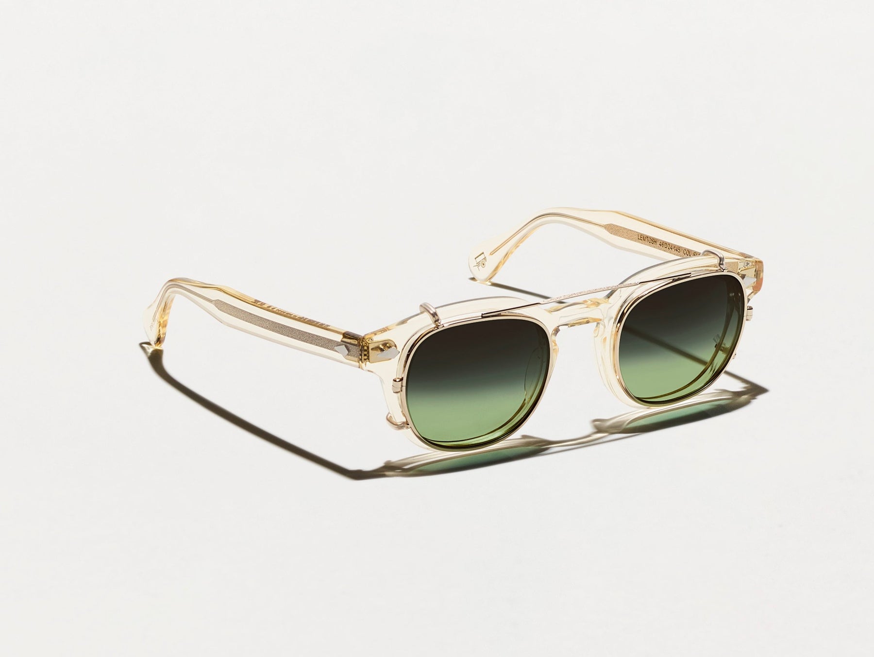 The CLIPTOSH in Gold with Forest Wood Tinted Lenses The CLIPTOSH in Gold with Forest Wood Tinted Lenses