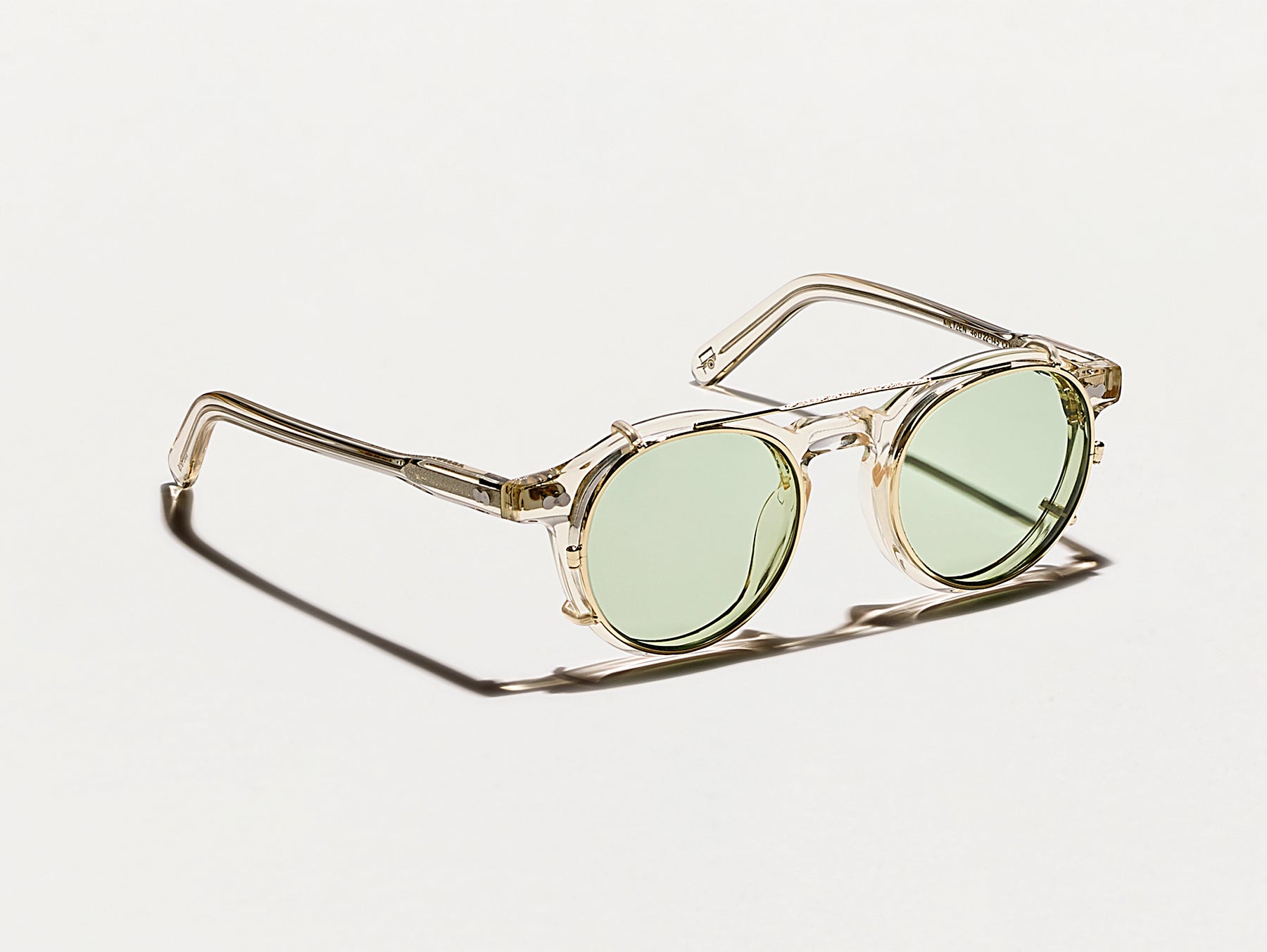The CLIPZEN in Gold with Limelight Fade Tinted Lenses The CLIPZEN in Gold with Limelight Fade Tinted Lenses