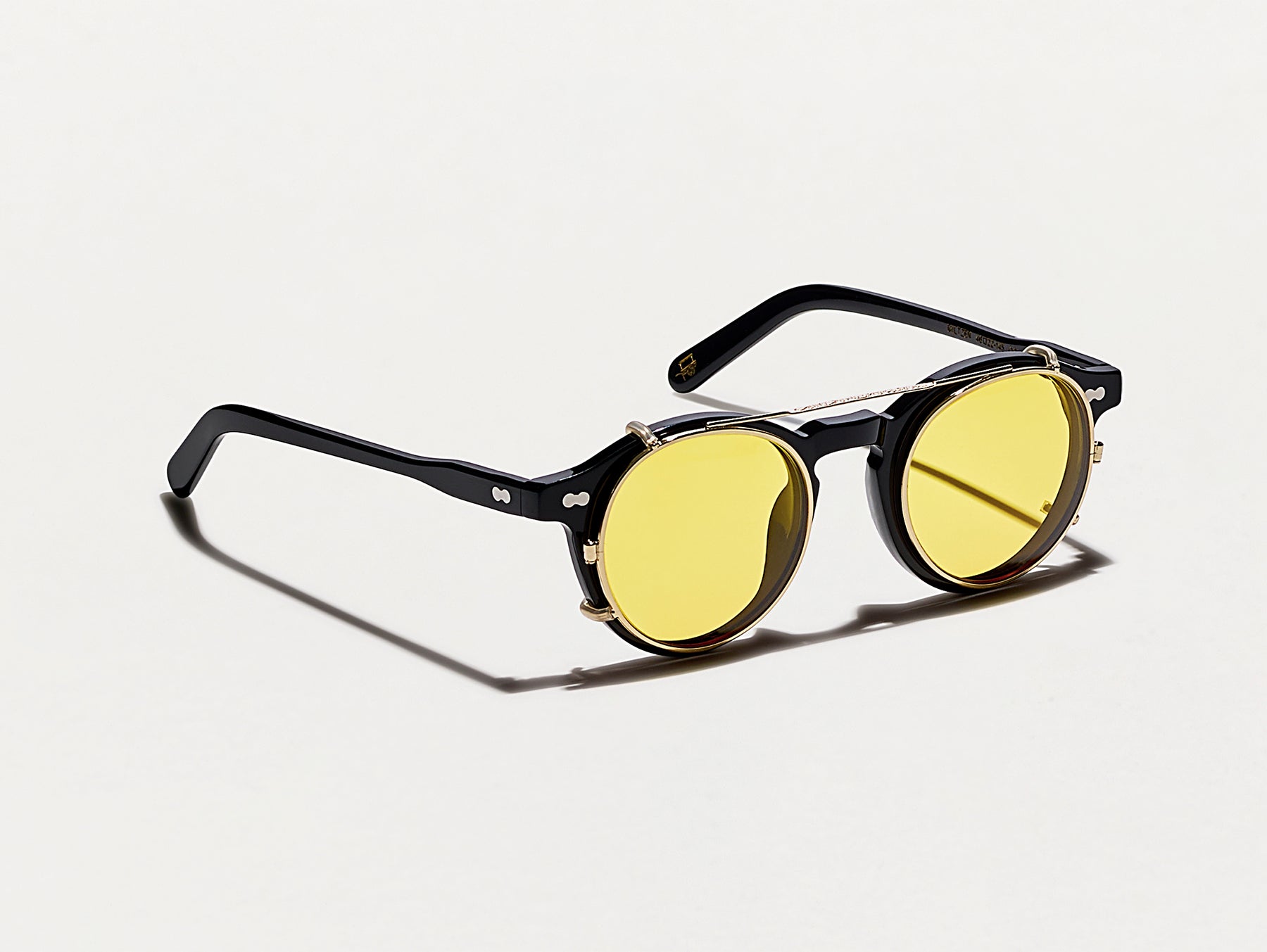 The CLIPZEN in Gold with Mellow Yellow Tinted Lenses The CLIPZEN in Gold with Mellow Yellow Tinted Lenses