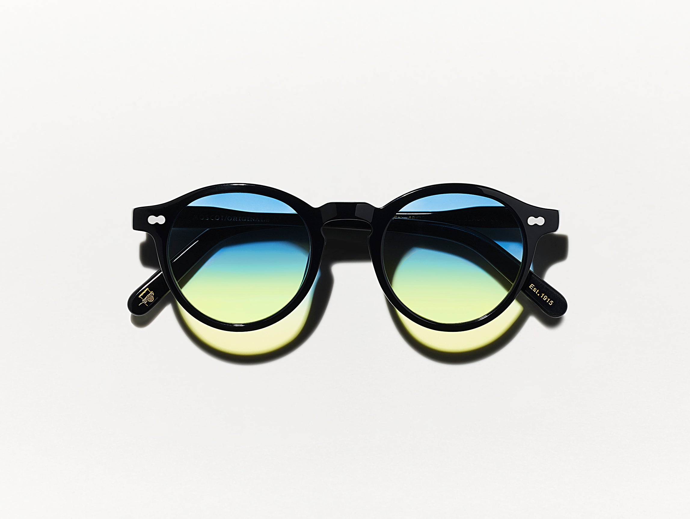 The MILTZEN Black with Aqua Sunrise Tinted Lenses