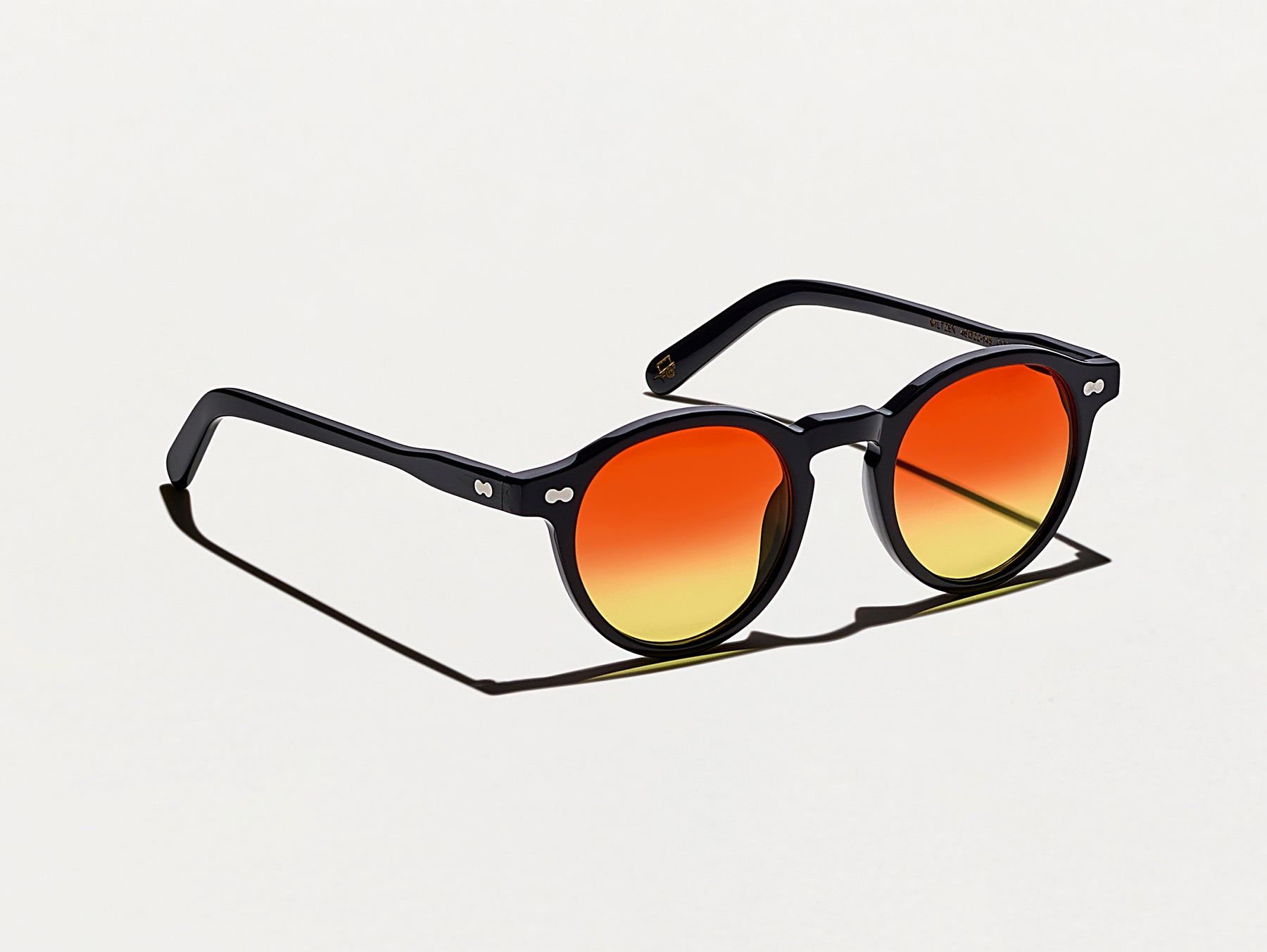 The MILTZEN Black with Candy Corn Tinted Lenses The MILTZEN Black with Candy Corn Tinted Lenses