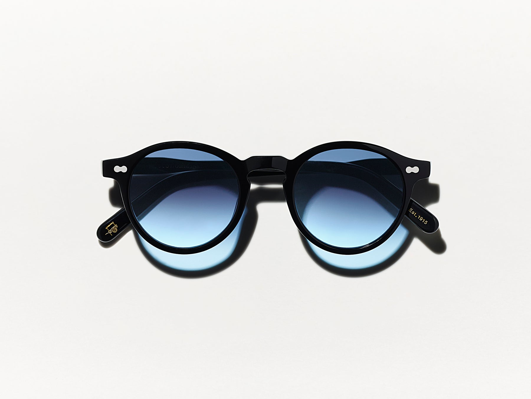 The MILTZEN Black with Denim Blue Tinted Lenses The MILTZEN Black with Denim Blue Tinted Lenses