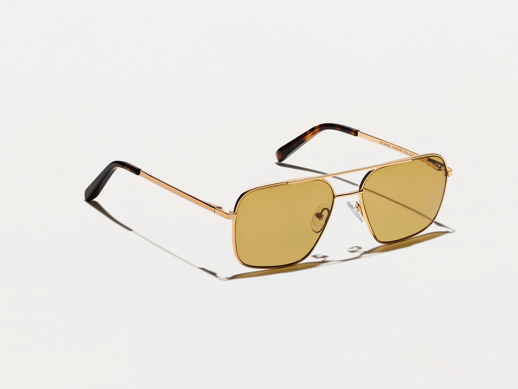 The SHTARKER in Gold with Amber Tinted Lenses The SHTARKER in Gold with Amber Tinted Lenses