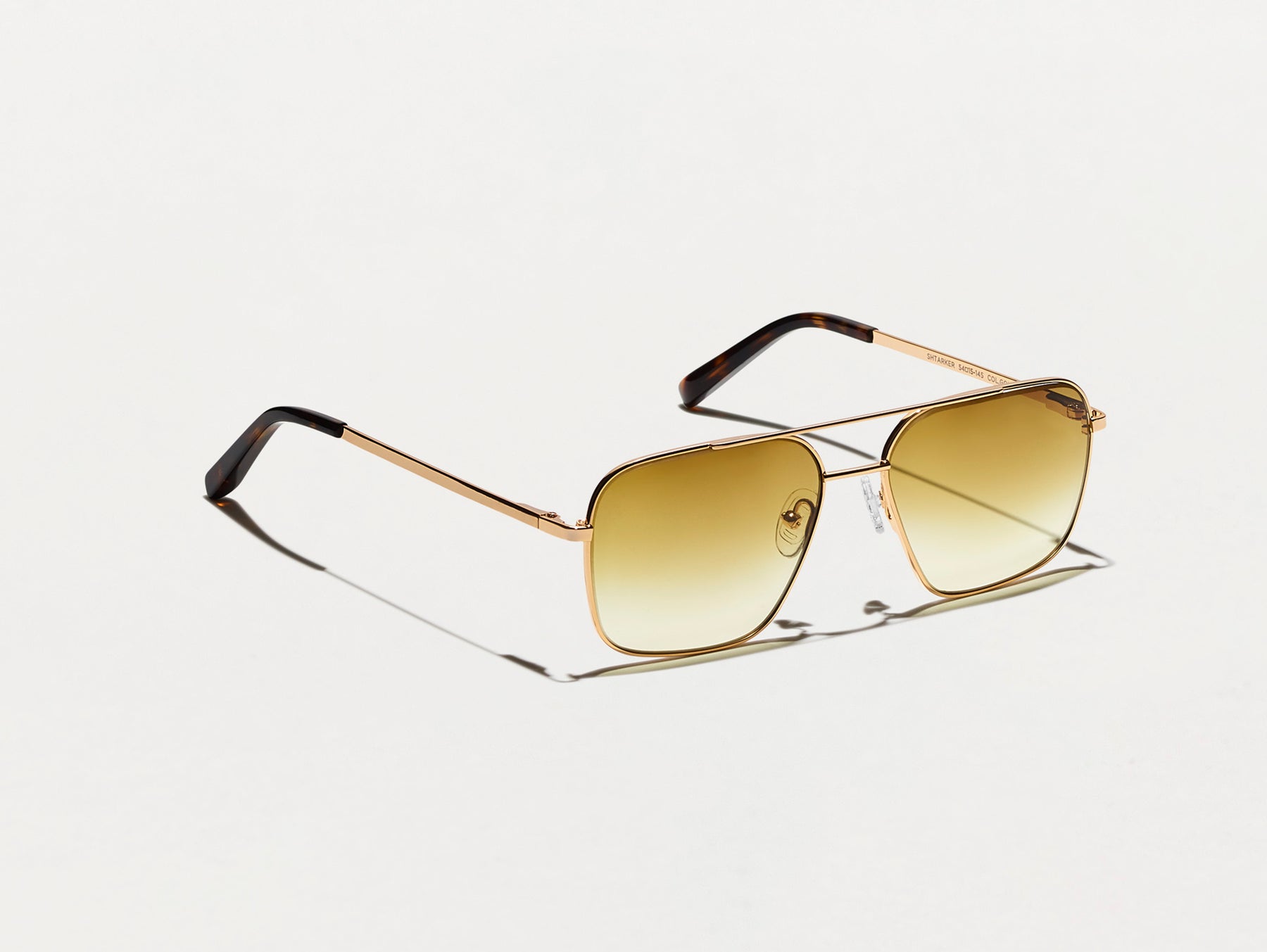 The SHTARKER in Gold with Chestnut Fade Tinted Lenses The SHTARKER in Gold with Chestnut Fade Tinted Lenses