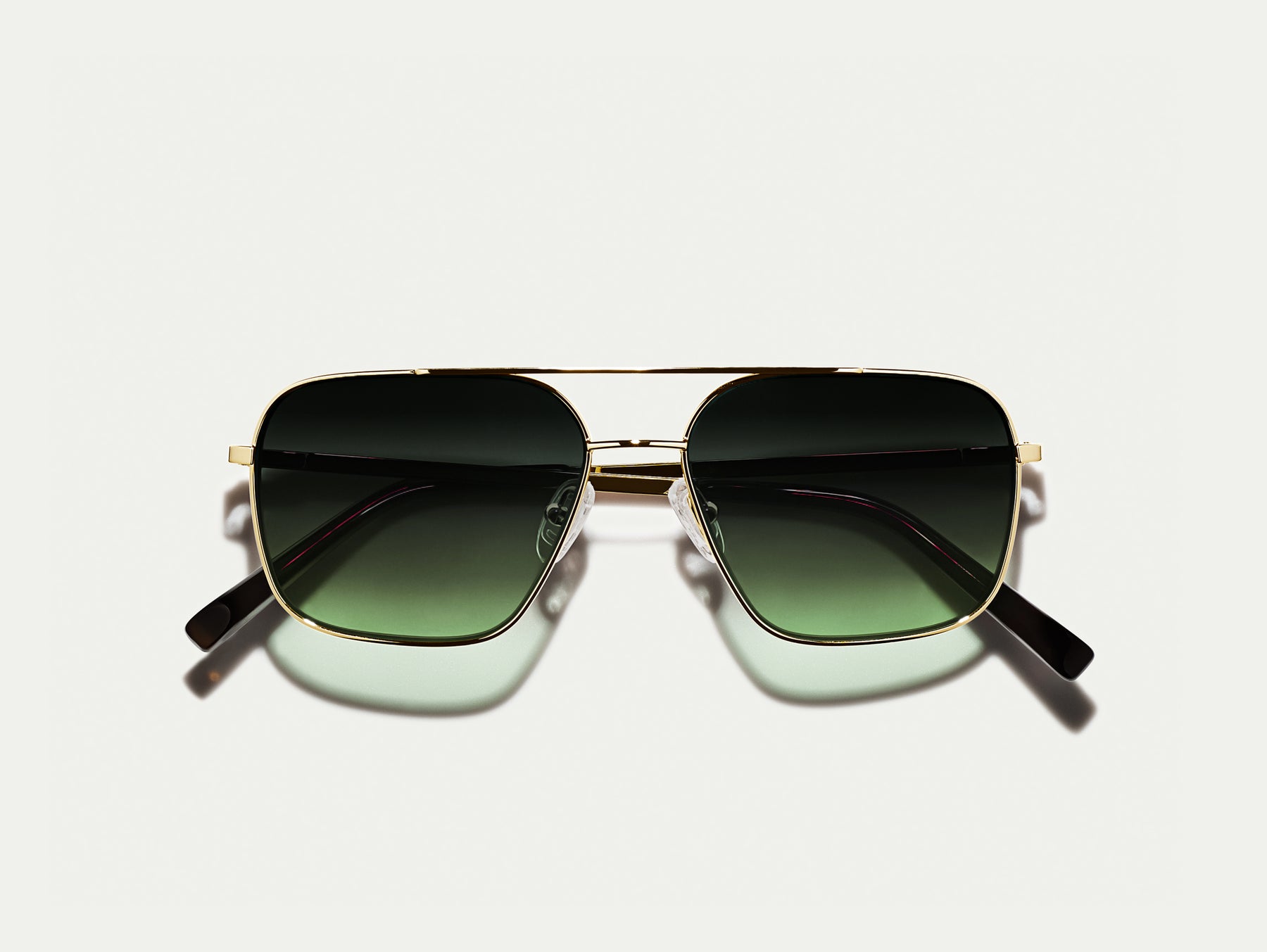 The SHTARKER in Gold with Forest Wood Tinted Lenses The SHTARKER in Gold with Forest Wood Tinted Lenses