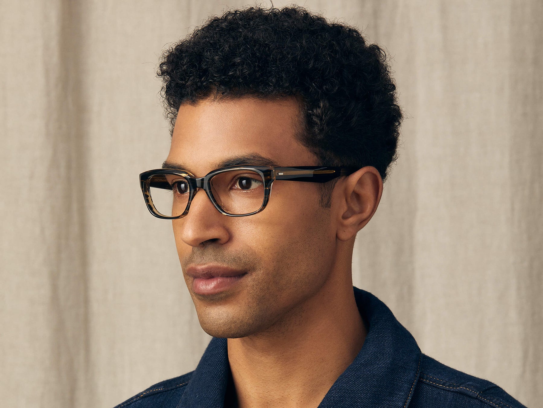 Model is wearing The ZINDIK in size 51 in Brown Bamboo Model is wearing The ZINDIK in size 51 in Brown Bamboo