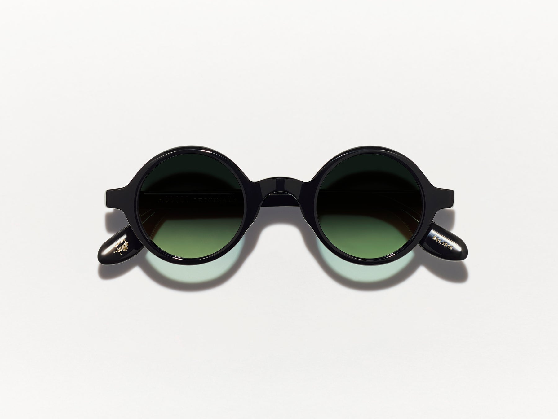The ZOLMAN in Black with Forest Wood Tinted Lenses The ZOLMAN in Black with Forest Wood Tinted Lenses