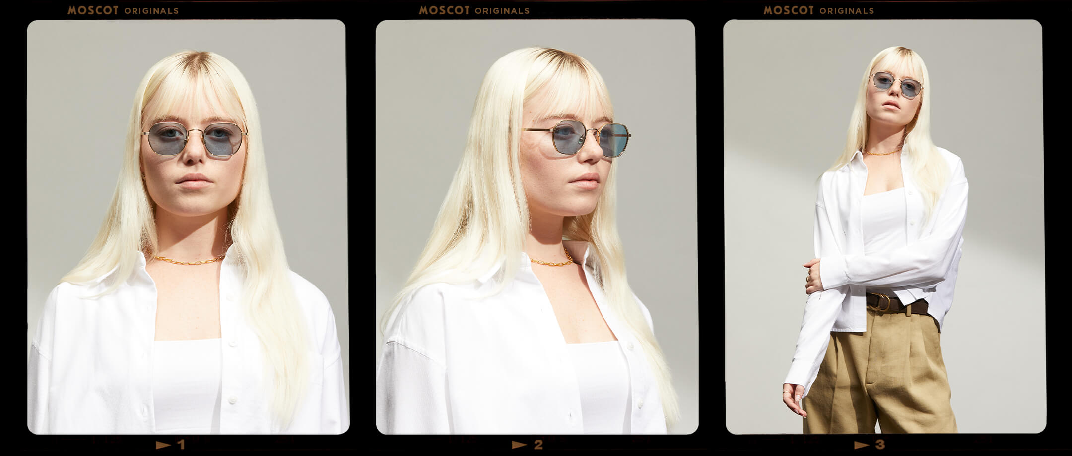 Model is wearing The UTZ SUN in size 50 in Gold with Blue Tinted Lenses