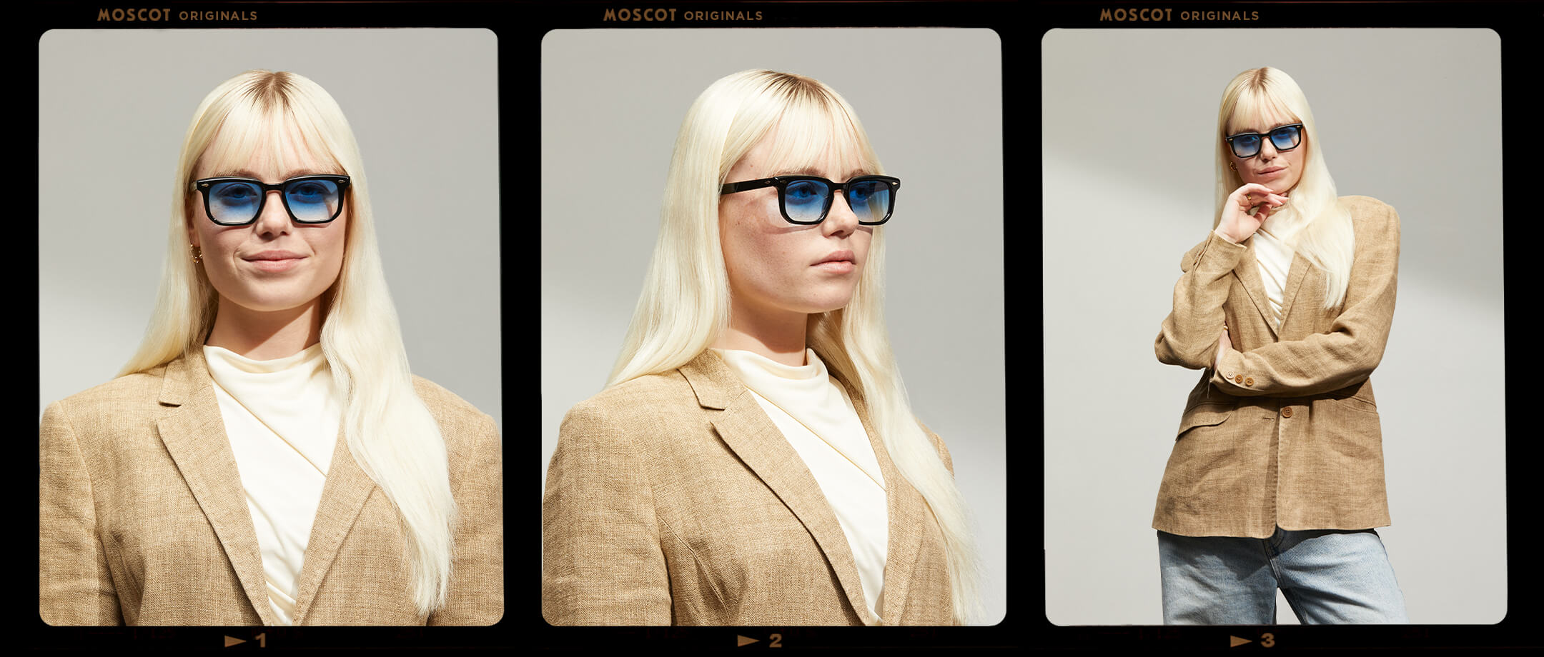 Model is wearing The ZISSEL SUN in size 49 in Black with Broadway Blue Tinted Lenses