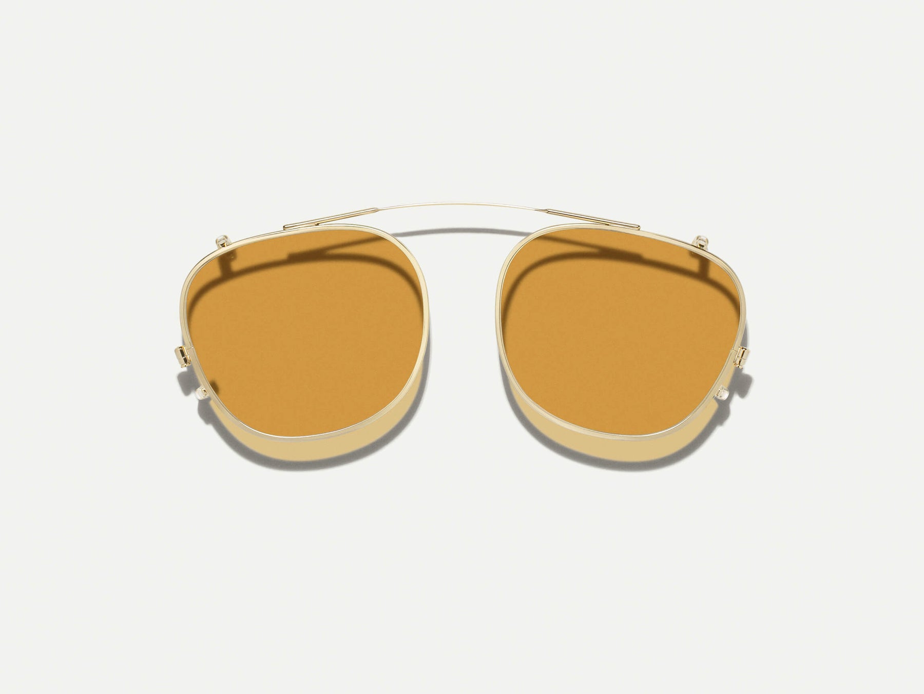 The ARTHUR CLIP  in Gold with Amber Tinted Lenses