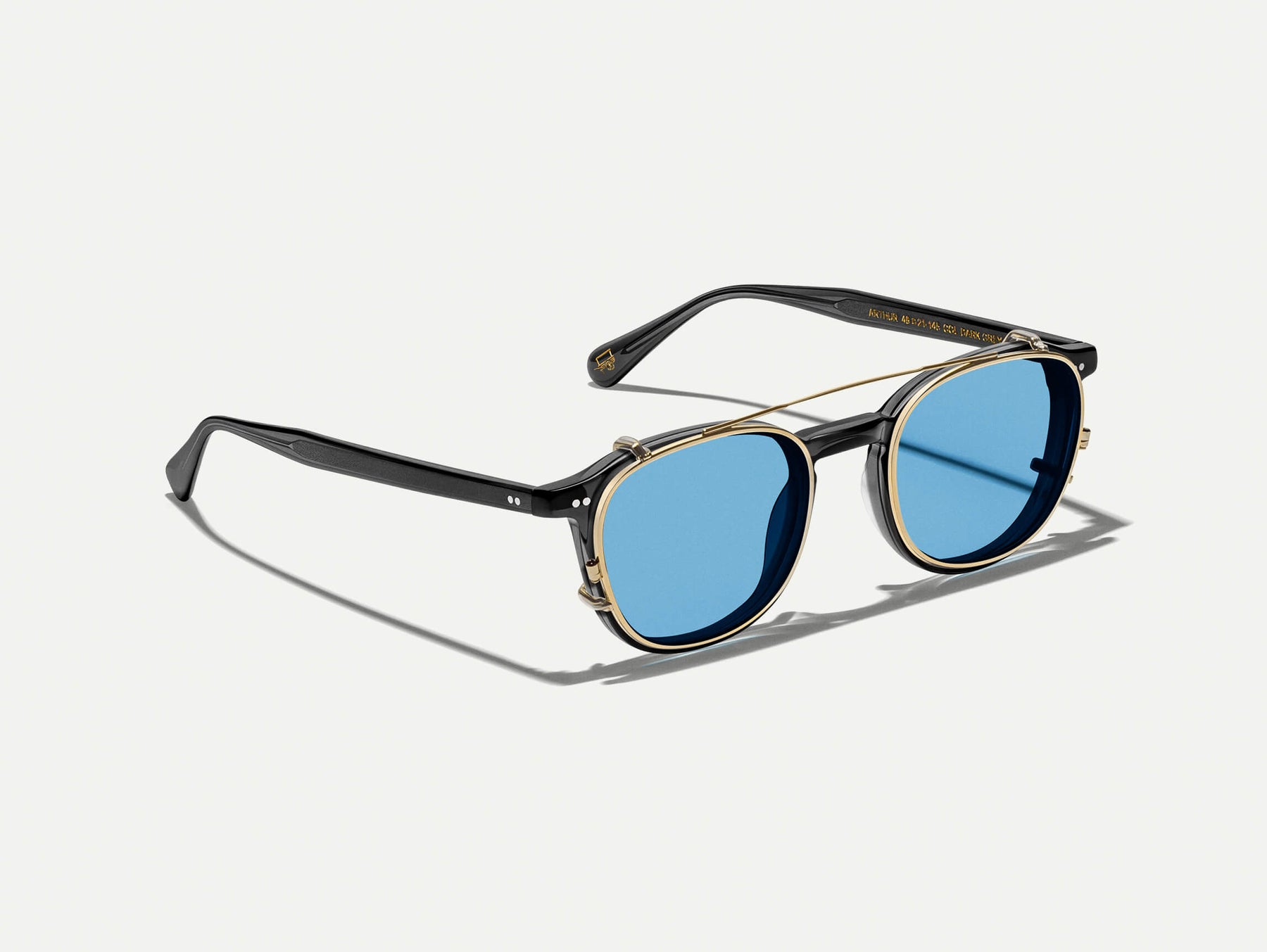 The ARTHUR CLIP  in Gold with Celebrity Blue Tinted Lenses