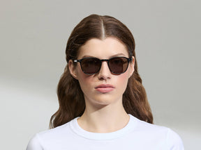 Model is wearing The ARTHUR in Black in size 51 with G-15 Tinted Lenses