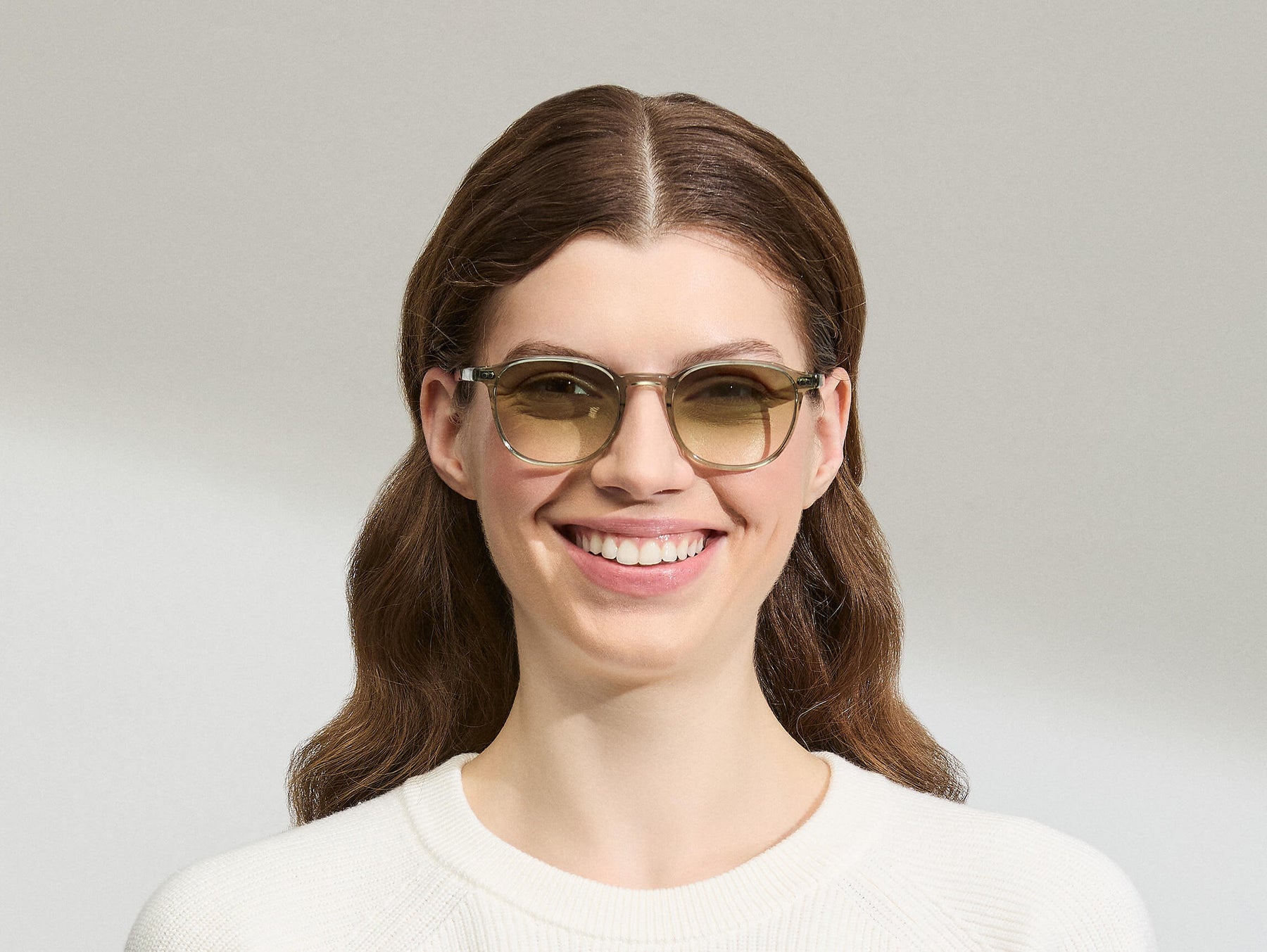 Model is wearing The ARTHUR in Sage in size 51 with G-15 Fade Tinted Lenses