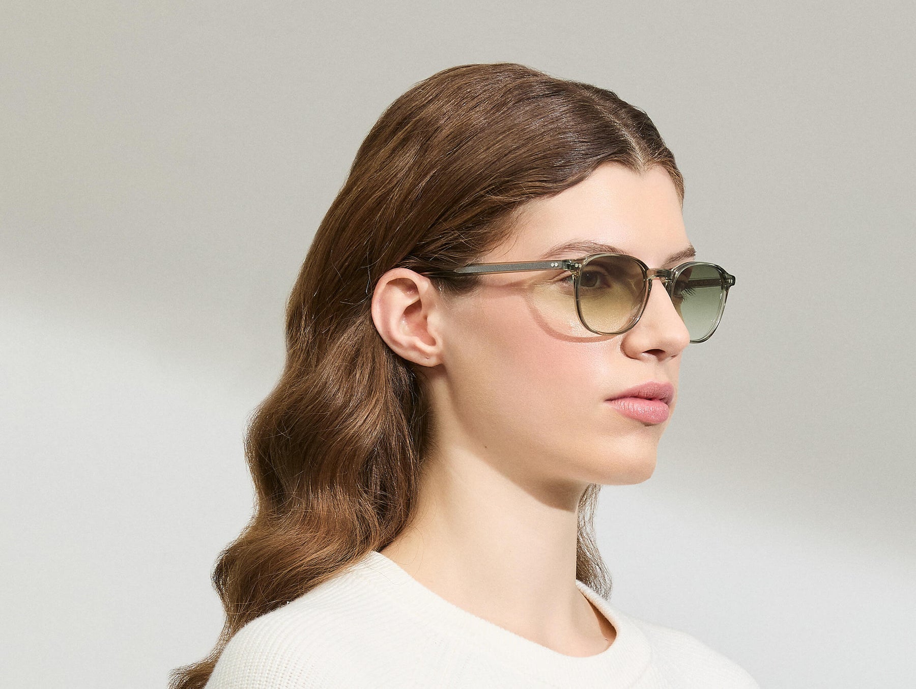 Model is wearing The ARTHUR in Sage in size 51 with G-15 Fade Tinted Lenses