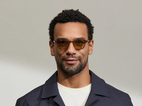 Model is wearing The ARTHUR in Tobacco in size 48 with Amber Tinted Lenses