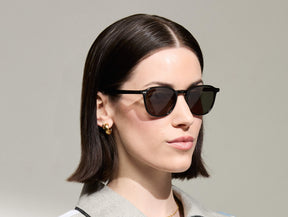 Model is wearing The ARTHUR SUN in Black in size 51 with G-15 Tinted Lenses