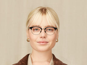 Model is wearing The AYGEN in size 48 in Black