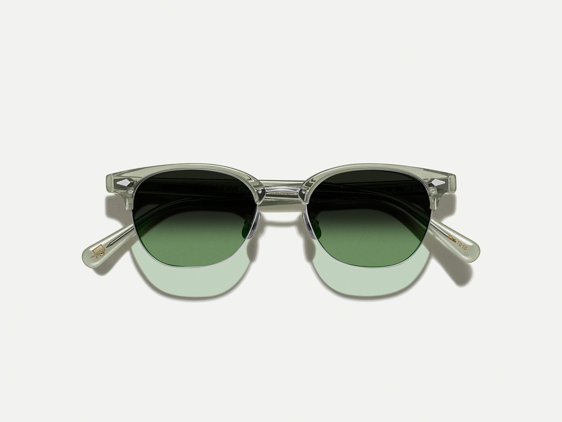 The AYGEN SUN in Sage with Forest Wood Tinted Lenses