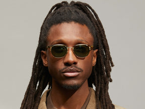 Model is wearing The AYGEN SUN in size 51 in Bamboo with G-15 Tinted Lenses