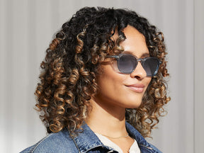 Model is wearing The BILLIK SUN in Light Blue in size 50 with Denim Blue Tinted Lenses