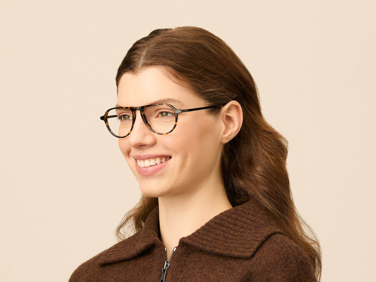 Model is wearing The BISHEART in size 52 in Tortoise