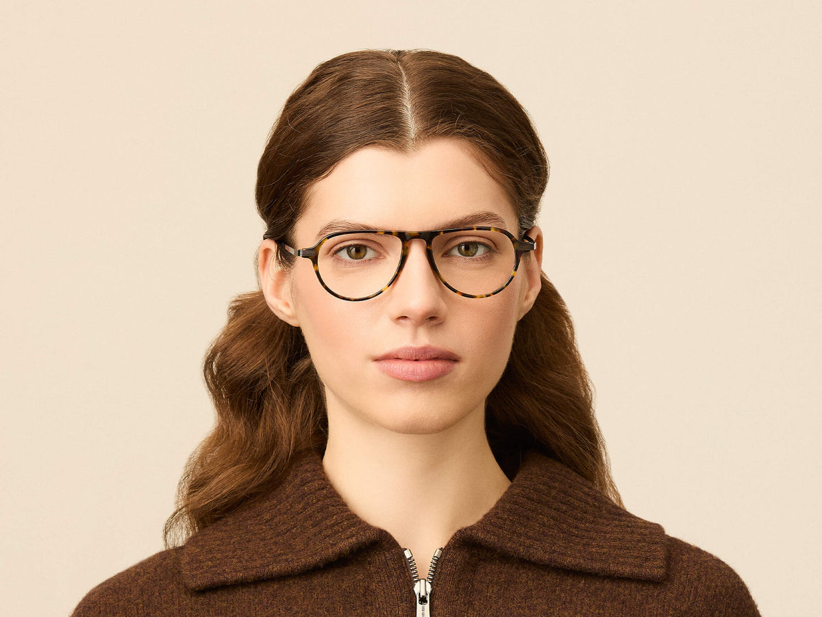 Model is wearing The BISHEART in size 52 in Tortoise