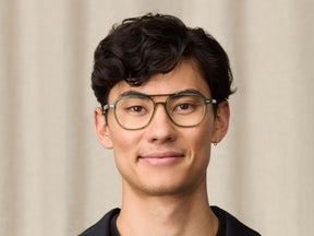 Model is wearing The BJORN in size 55 in Pine