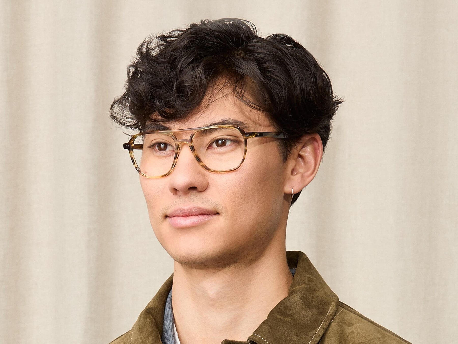 Model is wearing The BJORN in size 55 in Bamboo