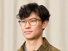 Model is wearing The BJORN in size 55 in Bamboo