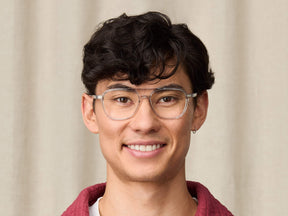 Model is wearing The BJORN in size 55 in Light Grey