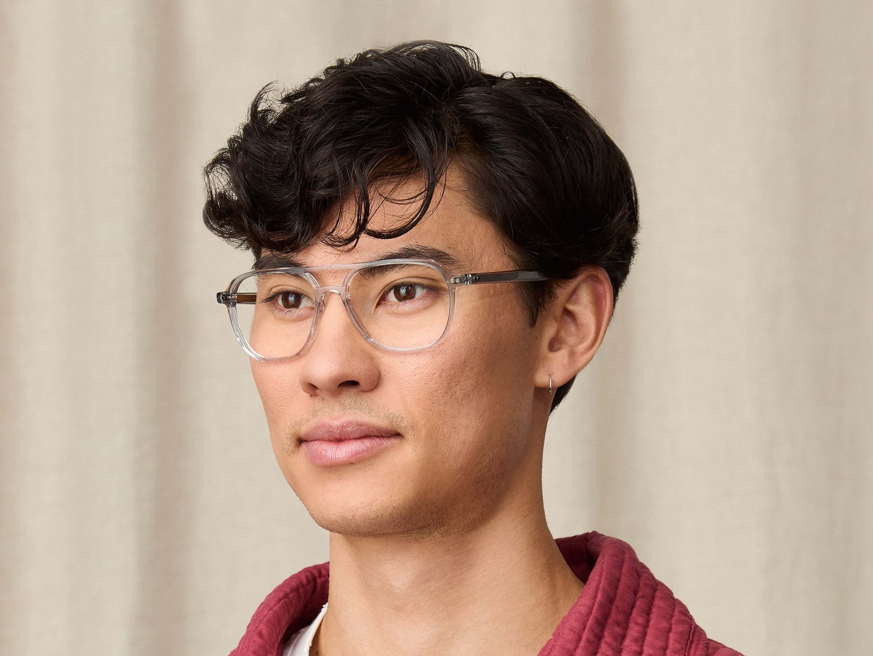 Model is wearing The BJORN in size 55 in Light Grey