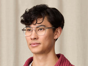 Model is wearing The BJORN in size 55 in Light Grey