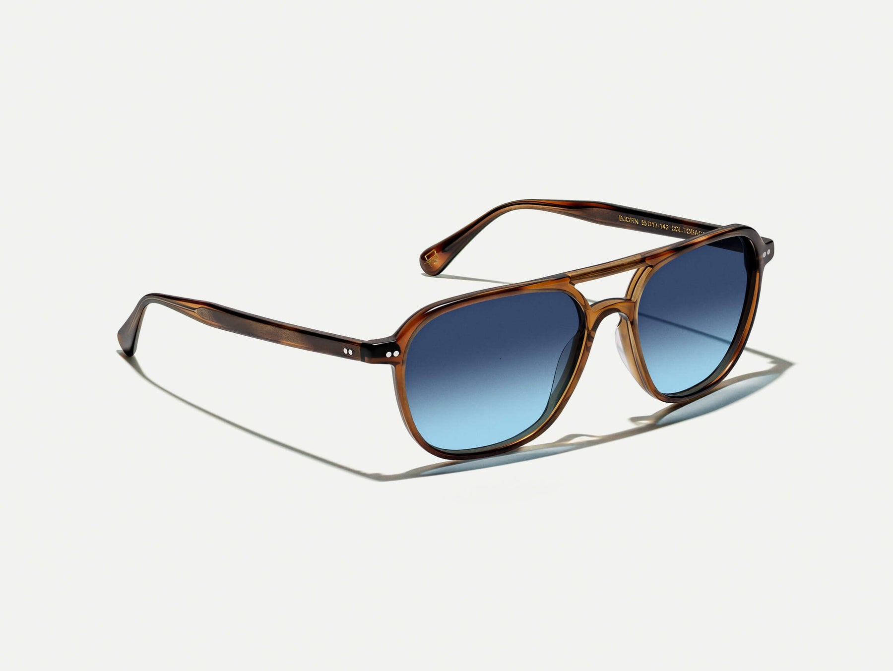 The BJORN SUN in Tobacco with Denim Blue Tinted Lenses