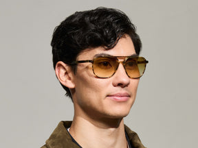 Model is wearing The BJORN SUN in Bamboo in size 58 with Chestnut Fade Tinted Lenses