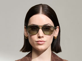 Model is wearing The BJORN SUN in Pine in size 58 with Forest Wood Tinted Lenses