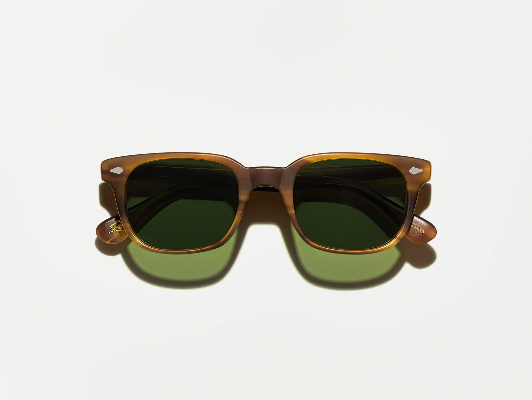 The BOYCHIK SUN in Matte Dark Blonde with Calibar Green Glass Lenses