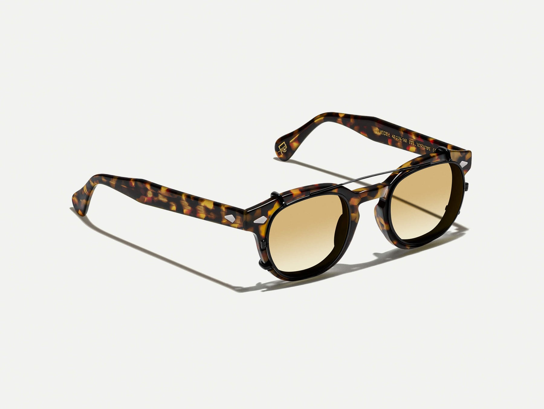 The CLIPTOSH in Matte Black with Chestnut Fade Tinted Lenses