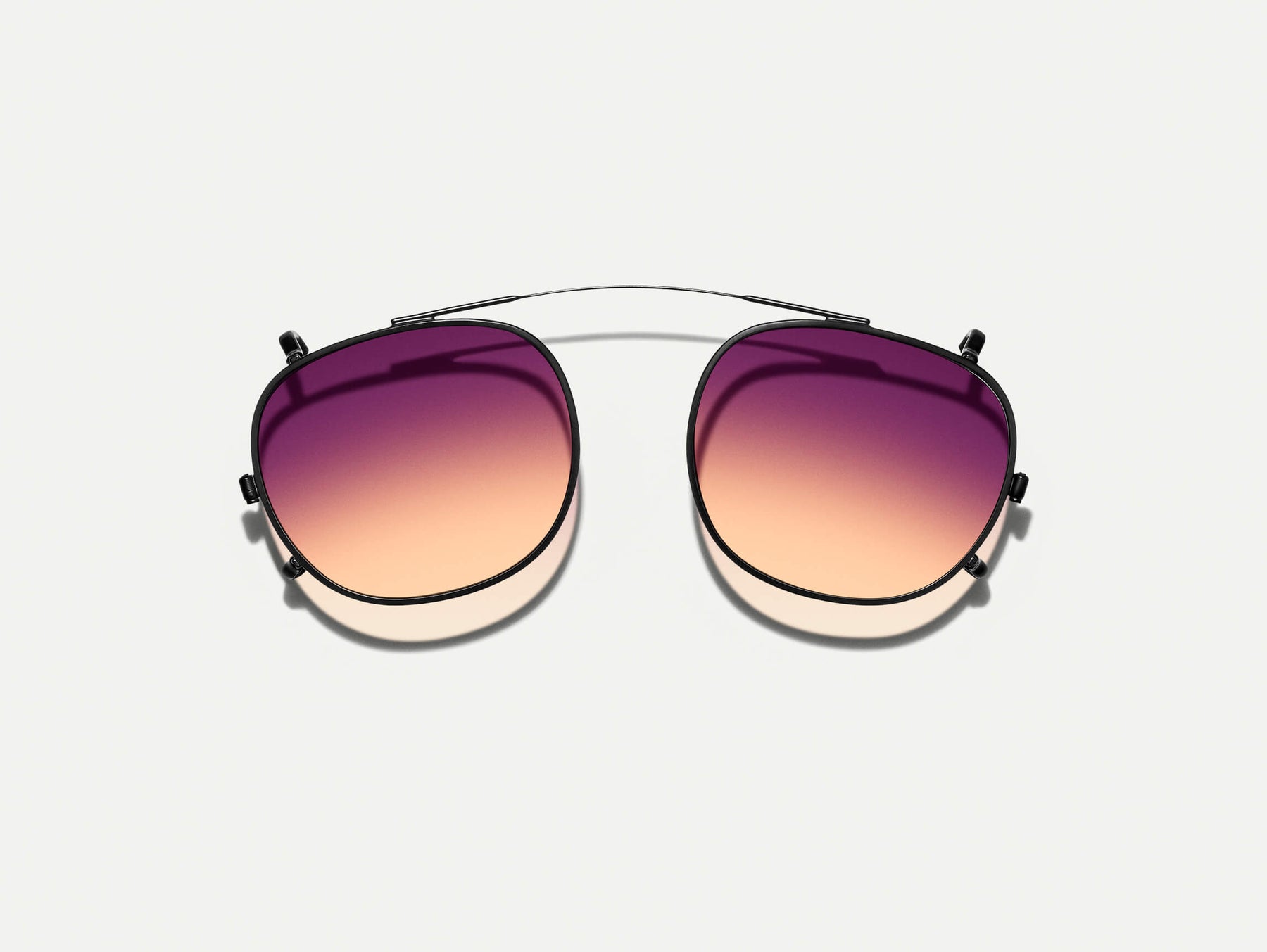 The CLIPTOSH in Matte Black with City Lights Tinted Lenses