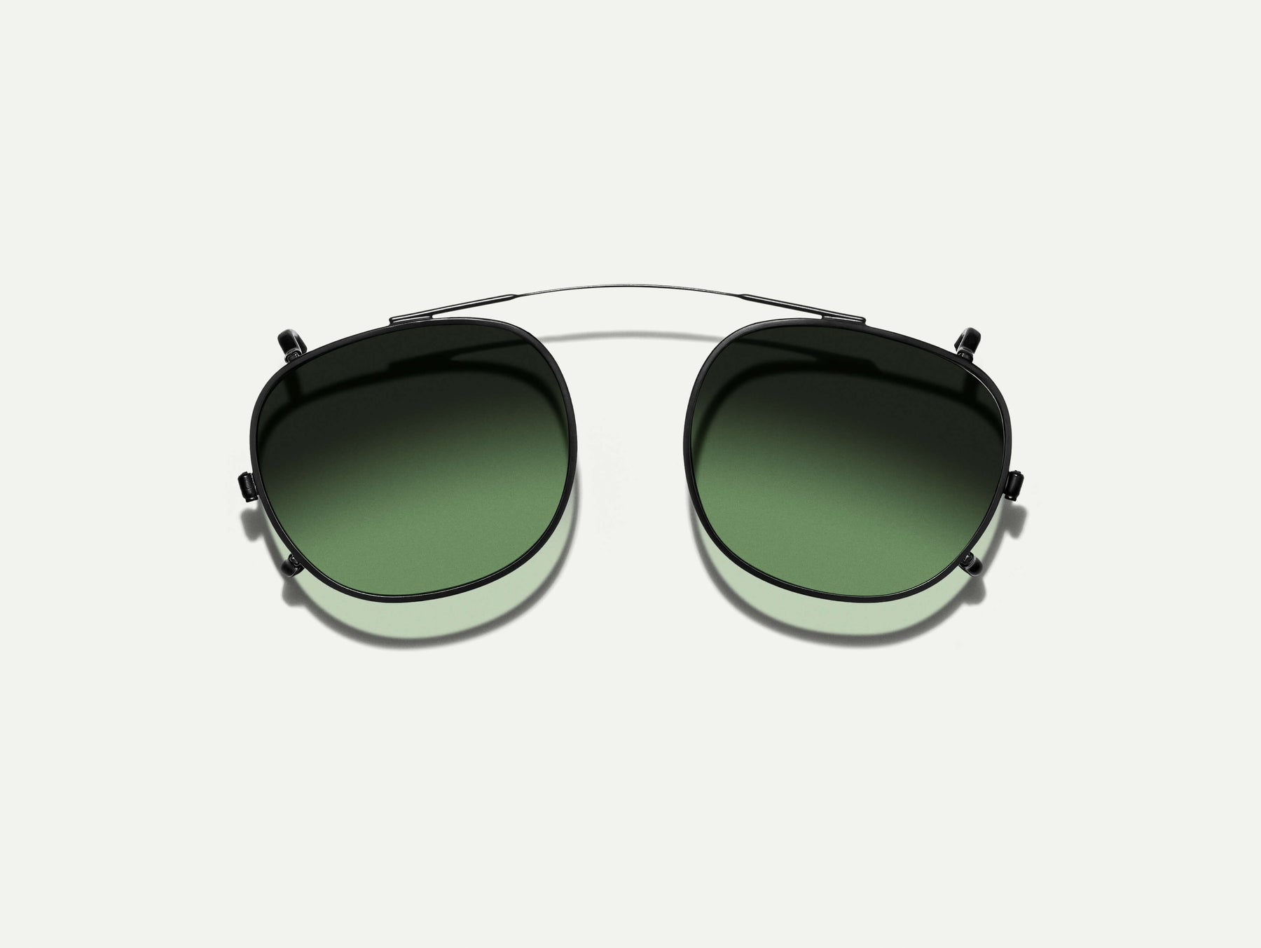 The CLIPTOSH in Matte Black with Forest Wood Tinted Lenses