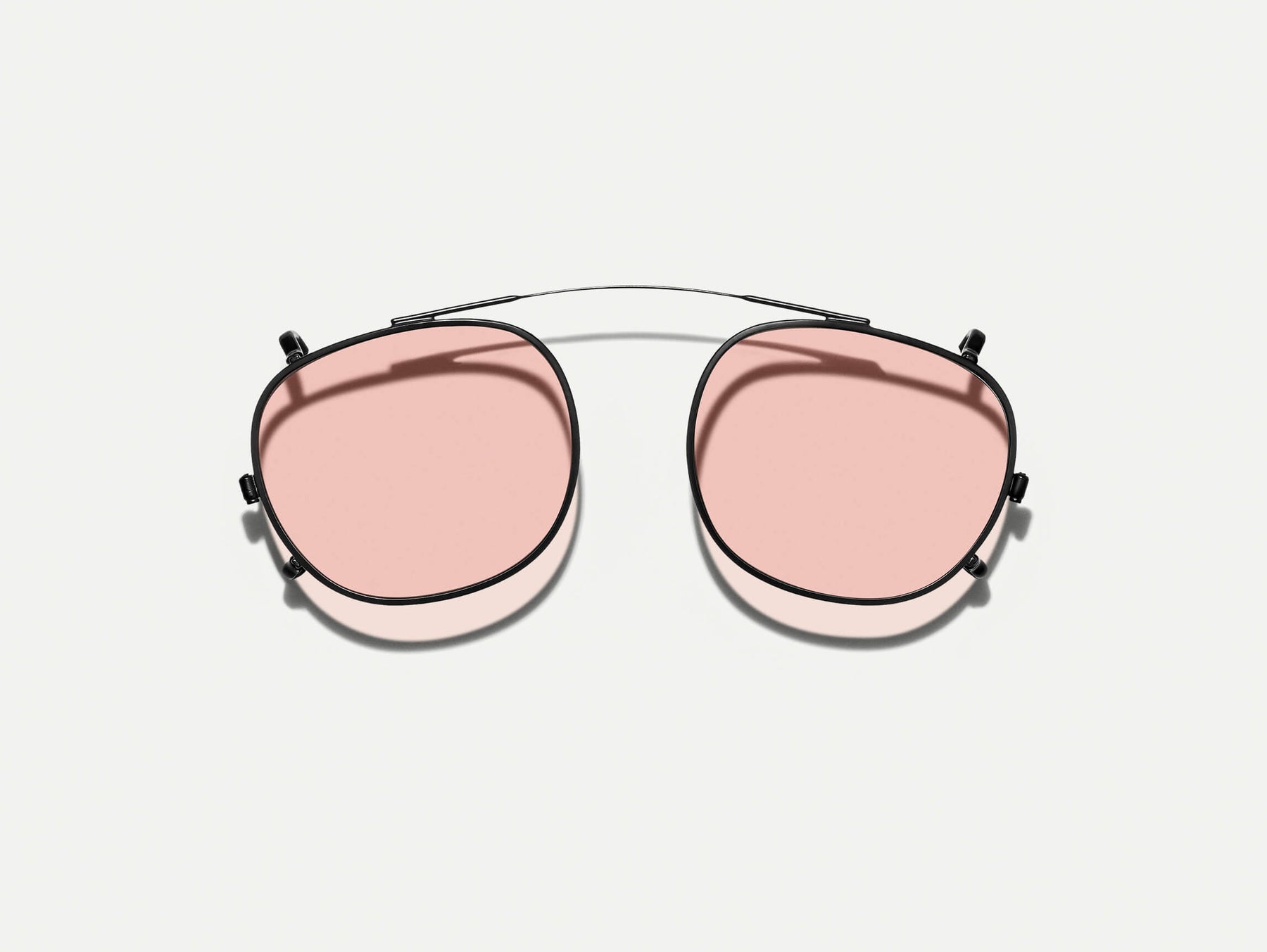 The CLIPTOSH in Matte Black with New York Rose Tinted Lenses