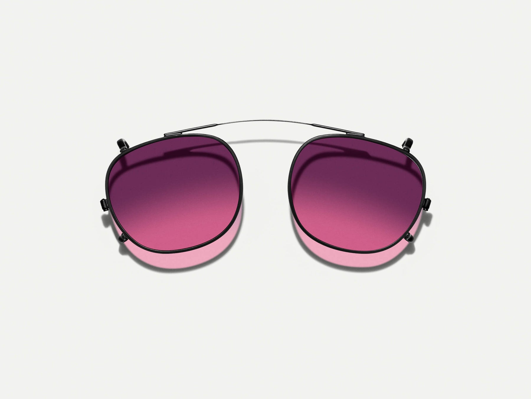 The CLIPTOSH in Matte Black with Westside Sunset Tinted Lenses