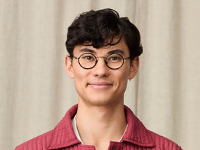 Model is wearing The COSNIC in size 44 in Black