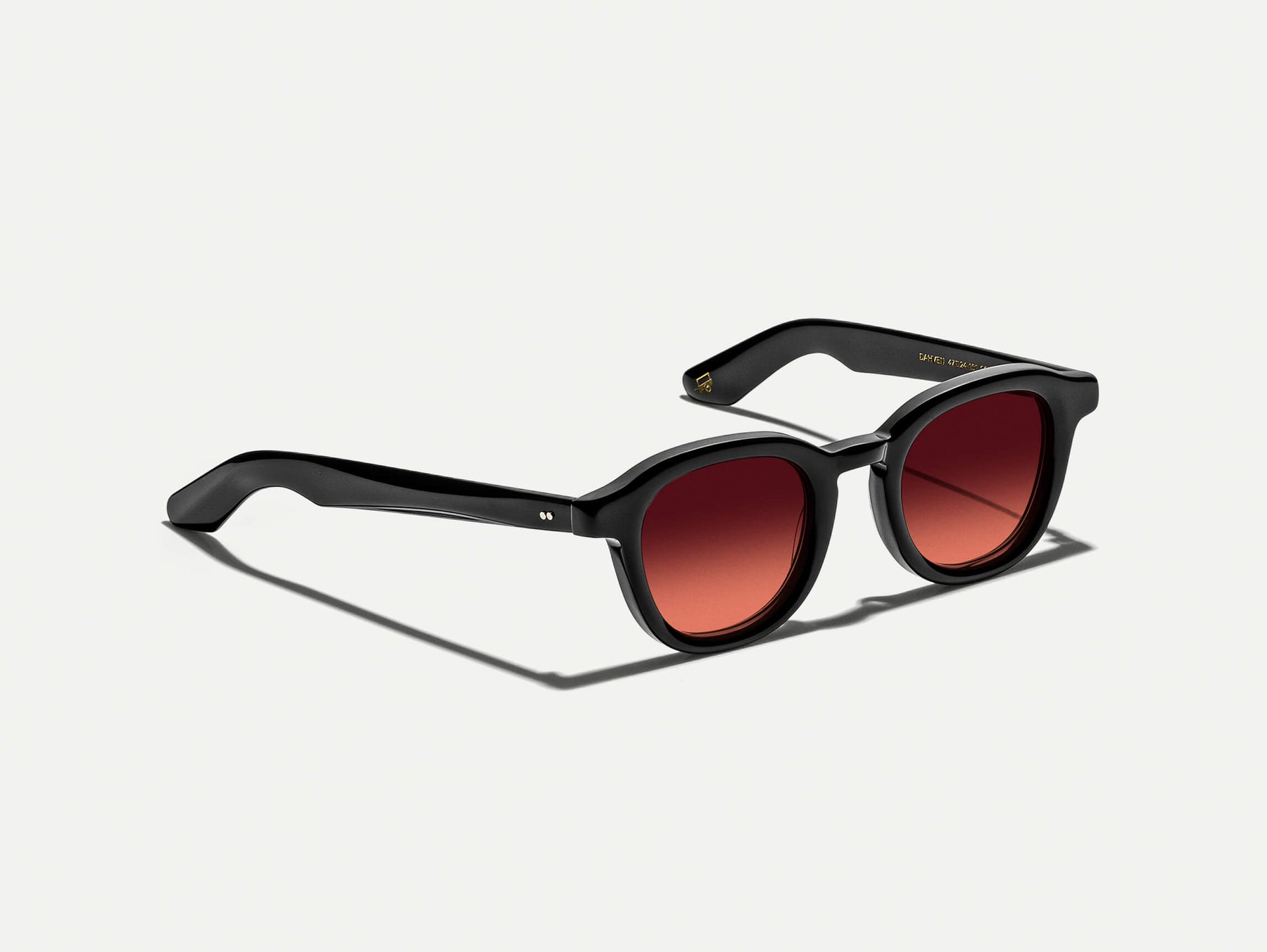 The DAHVEN Black with Cabernet Tinted Lenses