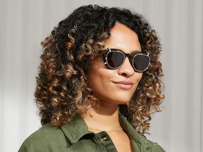 Model is wearing The DAHVEN CLIP in Gold in size 47 with G-15 Lenses