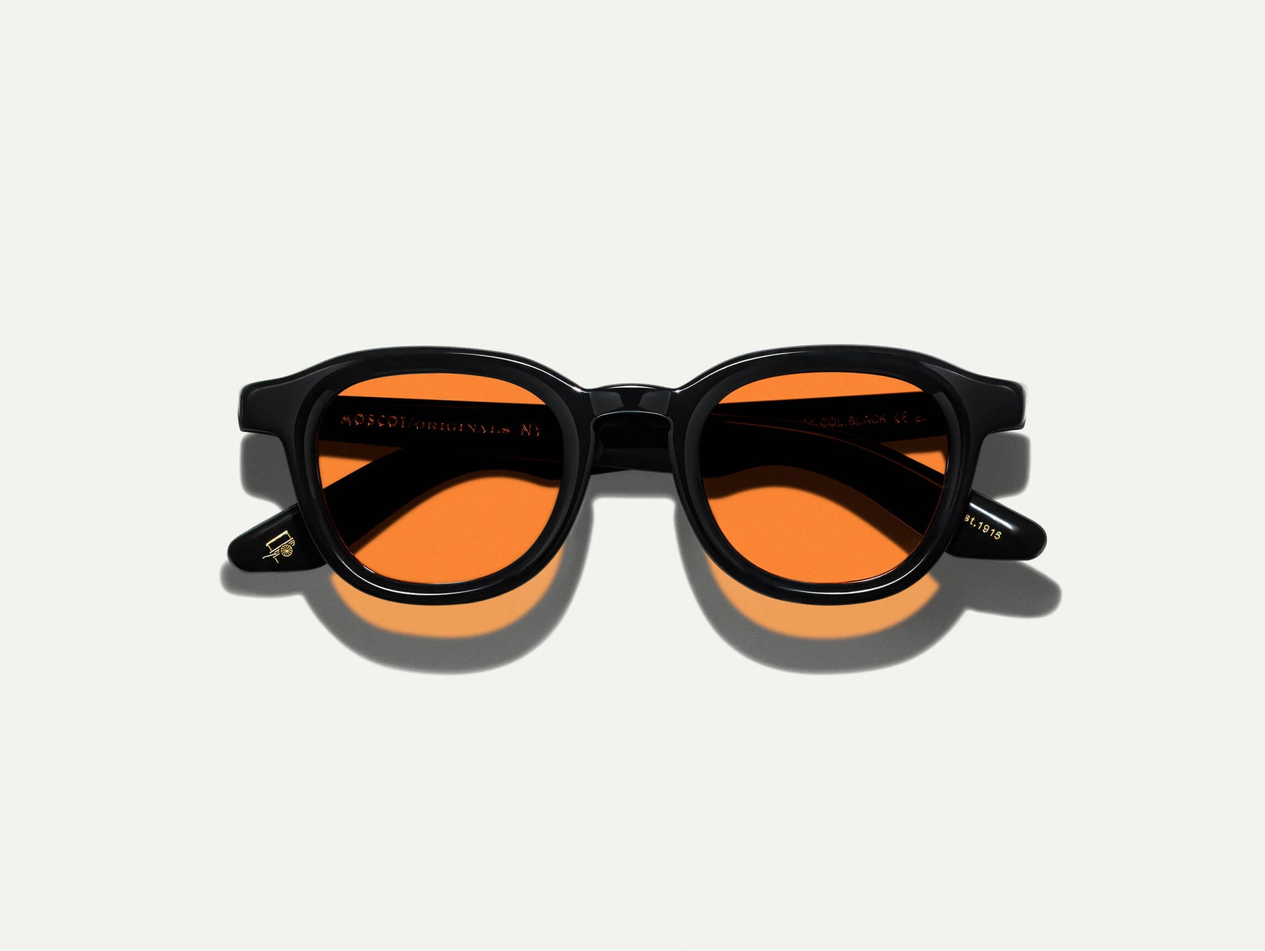The DAHVEN Black with Woodstock Orange Tinted Lenses