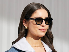 Model is wearing The DAHVEN in Black in size 47 with Forest Wood Tinted Lenses